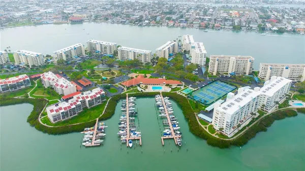an aerial view of a house with outdoor space