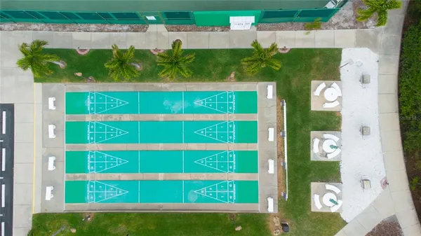 an aerial view of a house with outdoor space