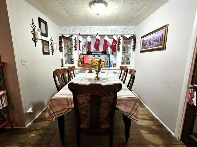 a view of a dining room with furniture