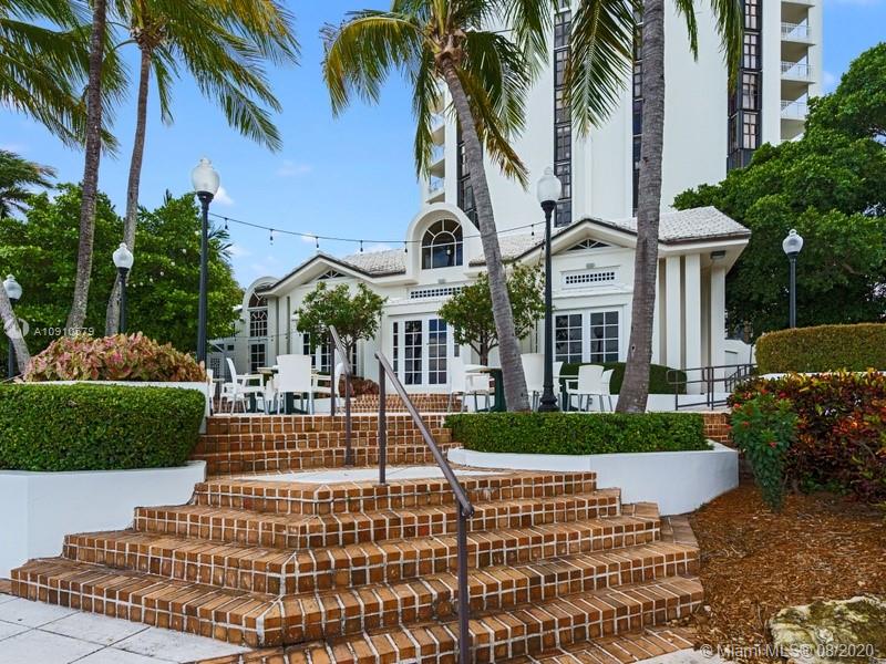 4000 Towerside Terrace, Unit 2302 Miami, FL 33138 - Photo 14 of 24 front view of a house with a yard