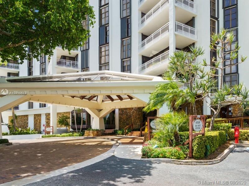 4000 Towerside Terrace, Unit 2302 Miami, FL 33138 - Photo 17 of 24 front view of a building with a street