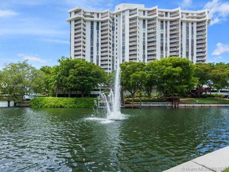 4000 Towerside Terrace, Unit 2302 Miami, FL 33138 - Photo 19 of 24 a view of a large building with a yard