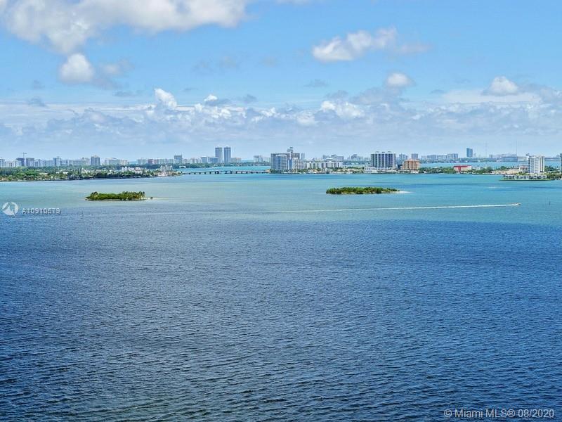 4000 Towerside Terrace, Unit 2302 Miami, FL 33138 - Photo 4 of 24 a view of a lake with a big yard