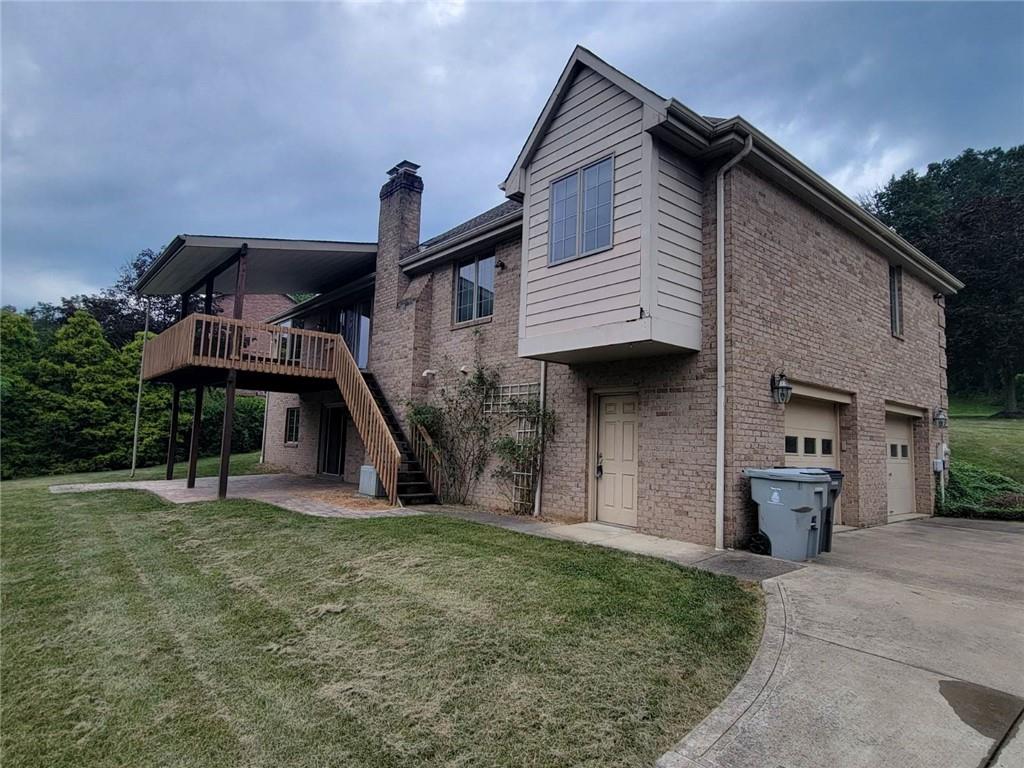 108 Oak Ridge Drive Venetia, PA 15367 - Photo 11 of 42 a front view of a house with a yard