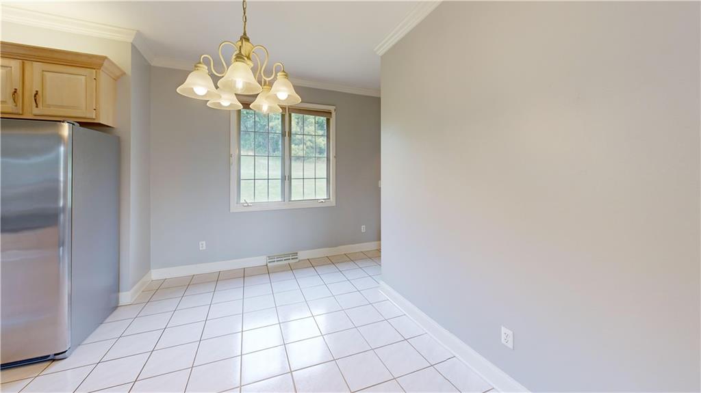 108 Oak Ridge Drive Venetia, PA 15367 - Photo 23 of 42 a view of an empty room with window