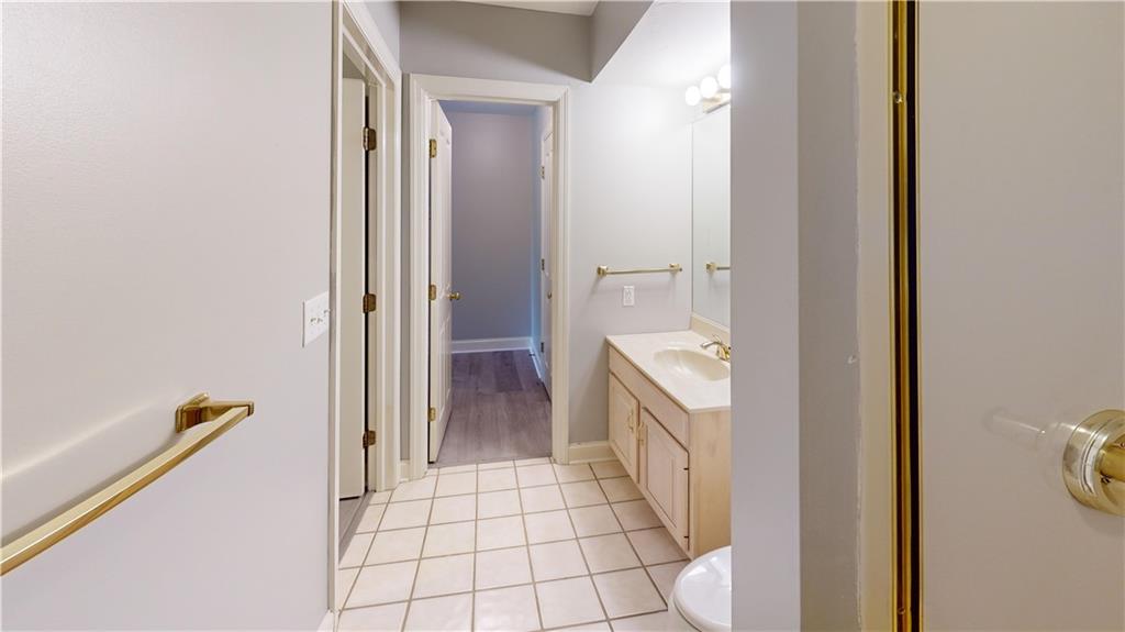 108 Oak Ridge Drive Venetia, PA 15367 - Photo 26 of 42 a bathroom with a sink and mirror with toilet