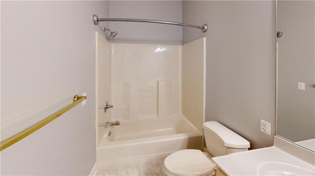 108 Oak Ridge Drive Venetia, PA 15367 - Photo 27 of 42 a bathroom with a toilet and a bathtub