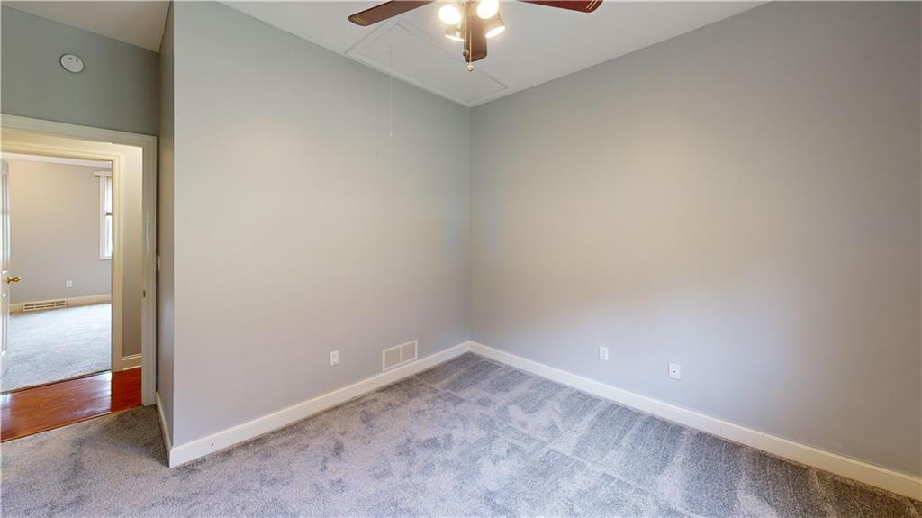108 Oak Ridge Drive Venetia, PA 15367 - Photo 30 of 42 a view of an empty room and chandelier fan