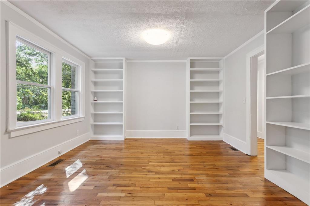 385 Sunset Drive Athens, GA 30606 - Photo 9 of 48 a view of a room with empty racks