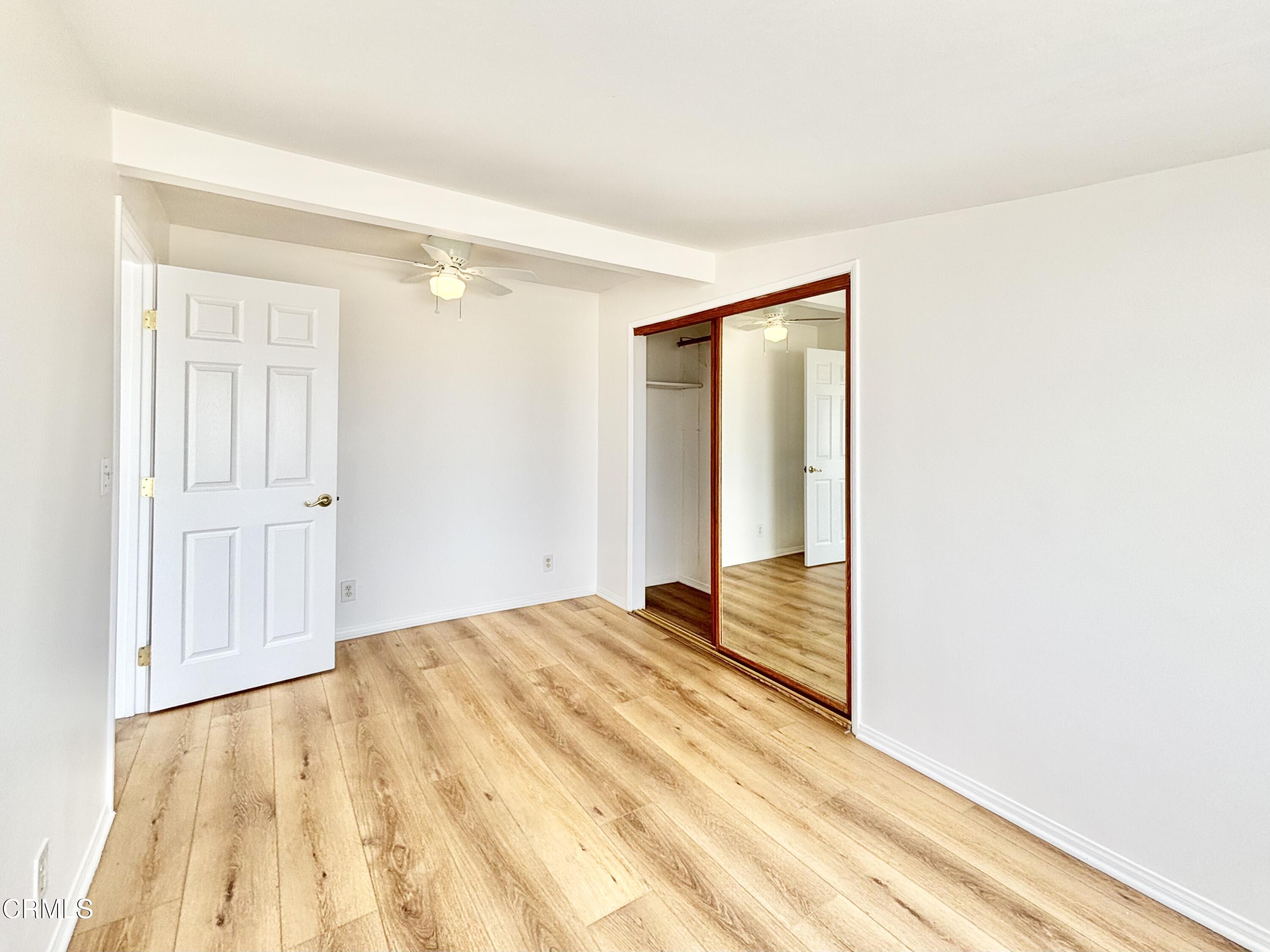 4029 Ocean Drive Oxnard, CA 93035 - Photo 14 of 20 a view of a room with wooden floor and bathroom
