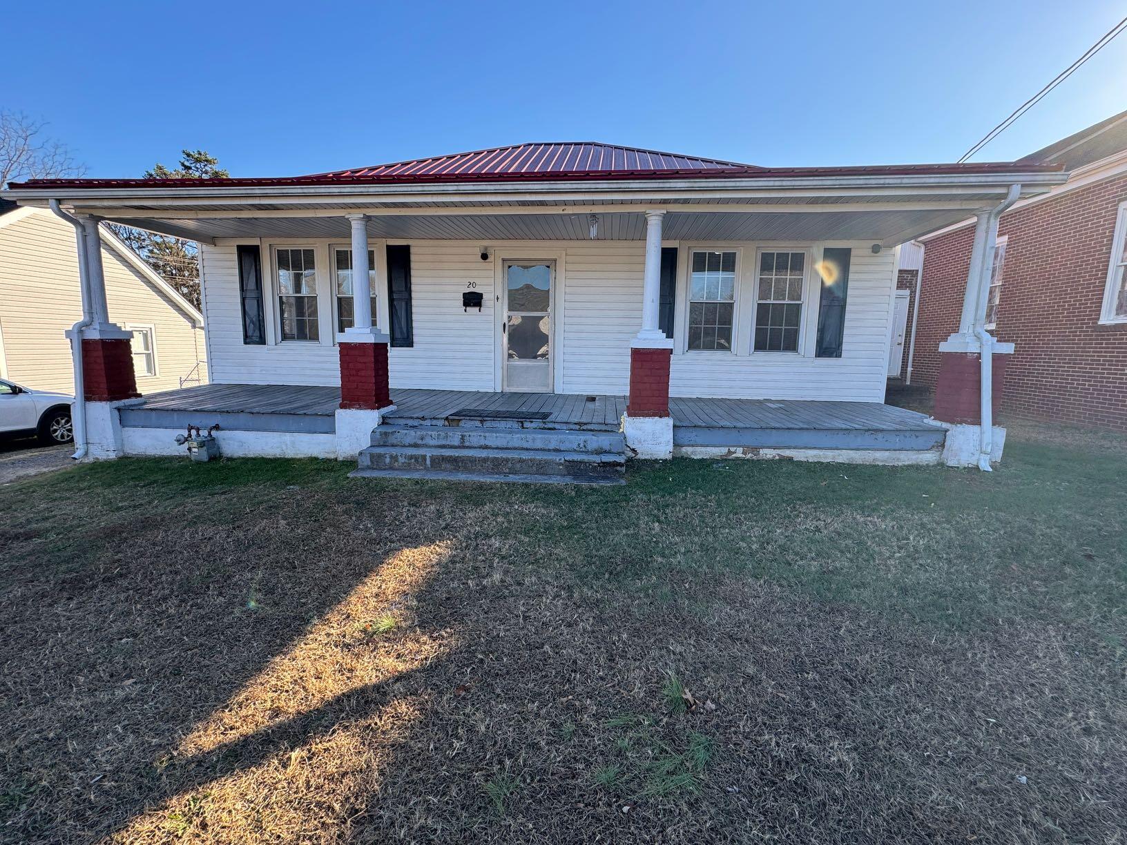 a view of house with outdoor space