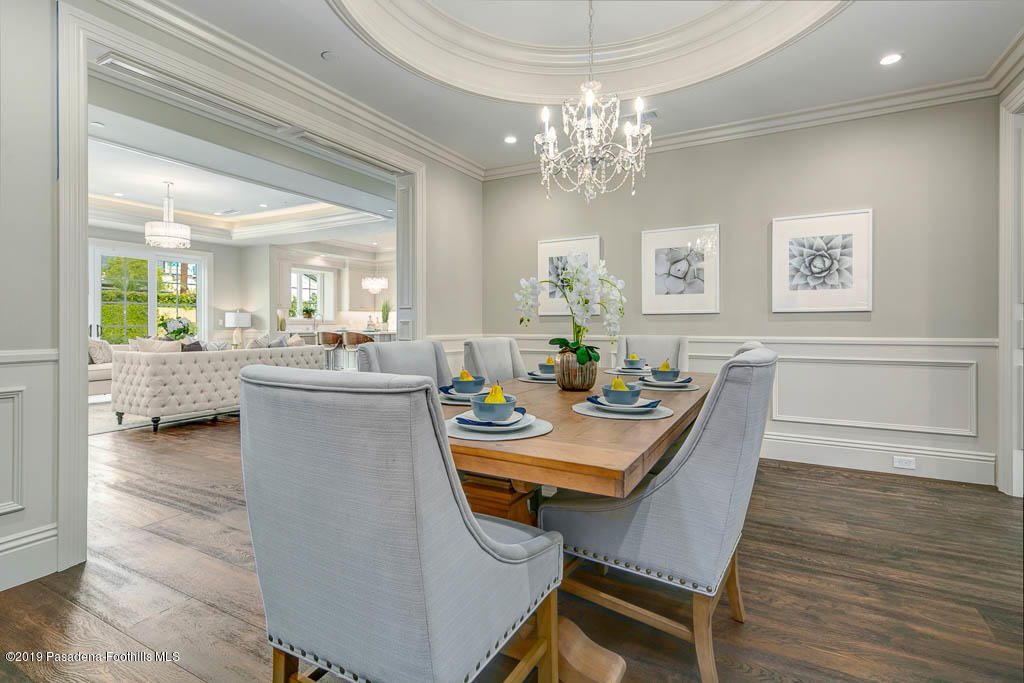 3675 Yorkshire Road Pasadena, CA 91107 - Photo 6 of 32 a dining room with furniture a chandelier and wooden floor