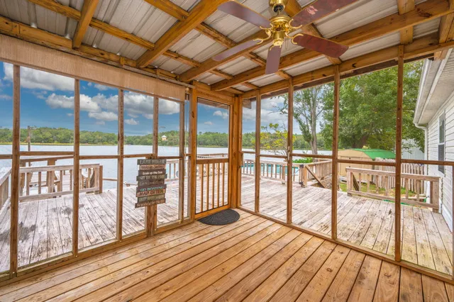 a view of hallway with wooden floor