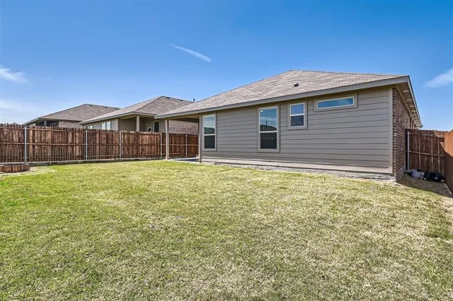 a house view with a garden space