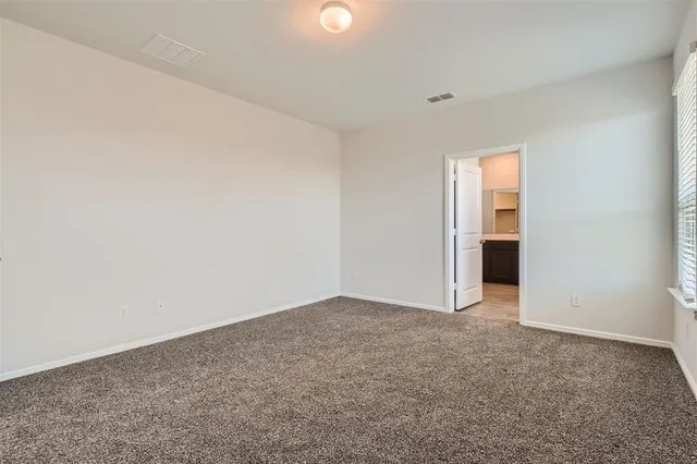 an empty room with an entryway