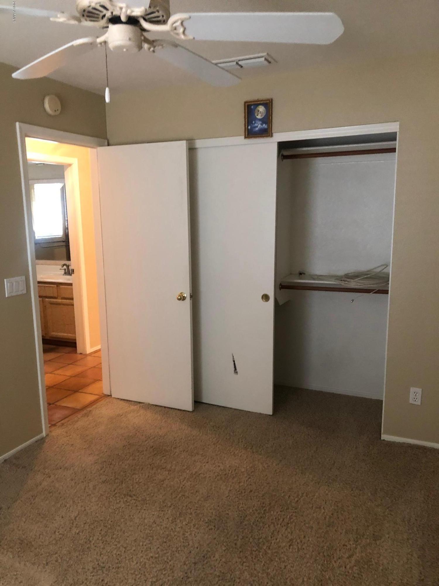 19022 North 24th Place Phoenix, AZ 85050 - Photo 11 of 20 a view of a refrigerator in kitchen and a sink