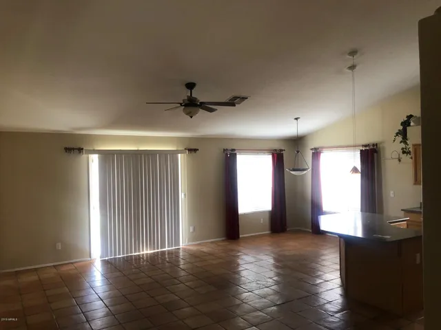 a view of empty room with a window