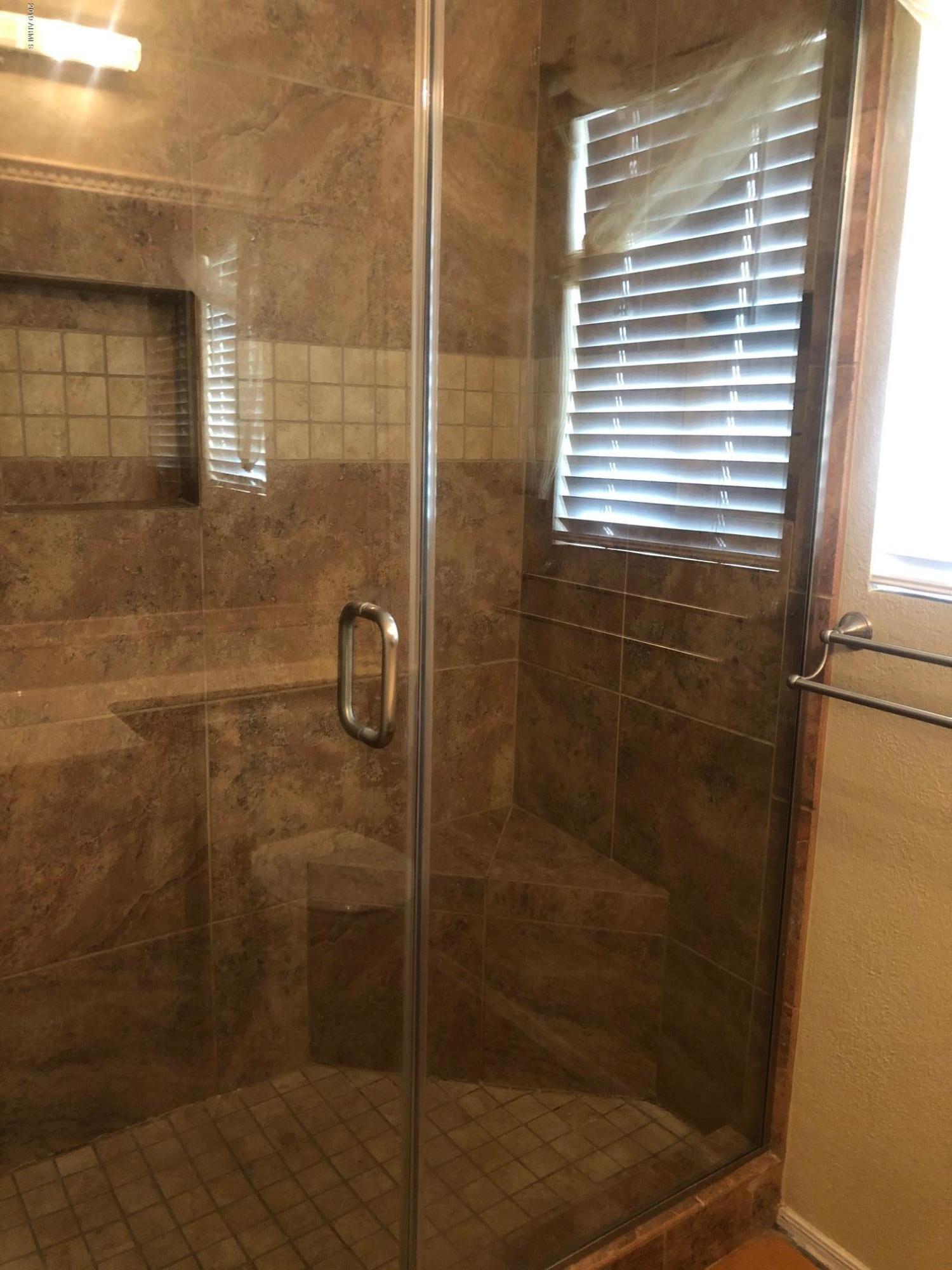 19022 North 24th Place Phoenix, AZ 85050 - Photo 10 of 20 a bathroom with a shower