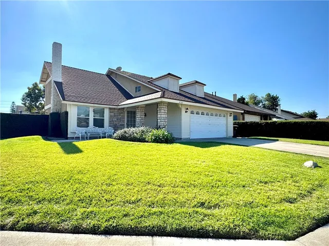 a view of a house with a swimming pool