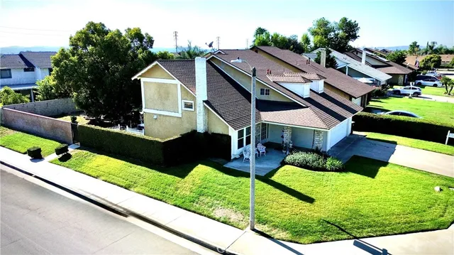 a aerial view of a house with porch