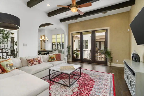 a living room with furniture and a rug