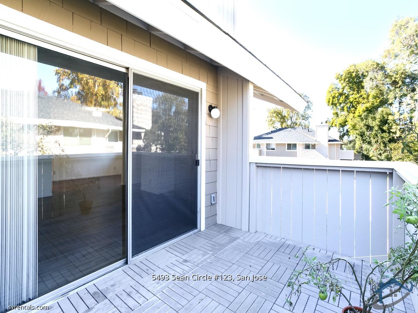 5493 Sean Circle, Unit 123 San Jose, CA 95123 - Photo 19 of 22 a view of a glass door with a yard