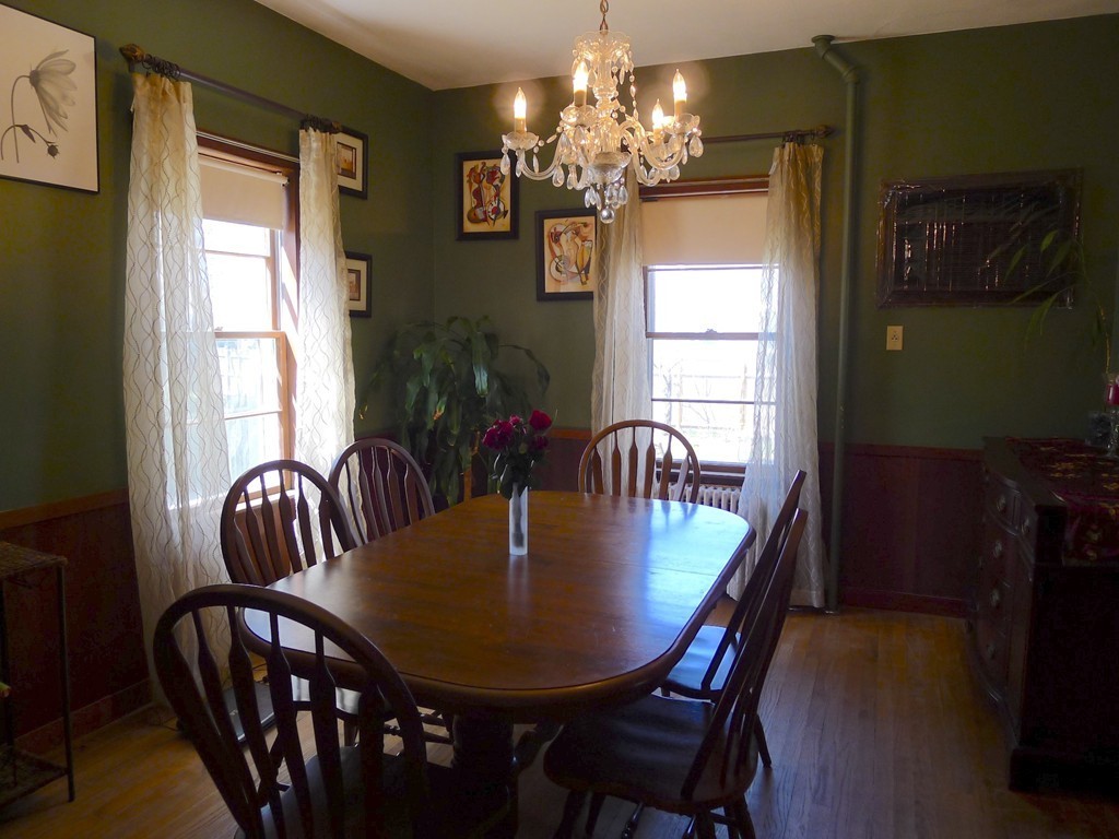 99 Sachem Road Needham, MA 02494 - Photo 8 of 13 a view of a dining room with furniture and window