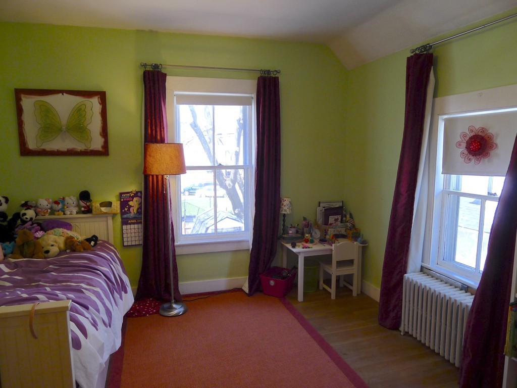 99 Sachem Road Needham, MA 02494 - Photo 10 of 13 a bed room with a bed and a window
