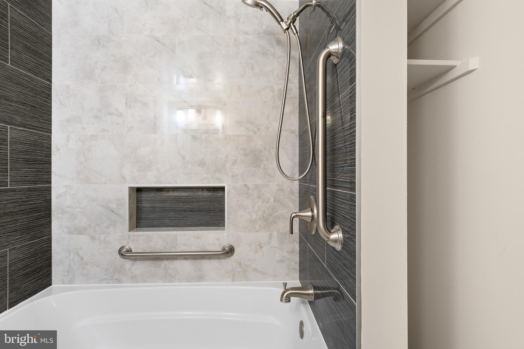 19027 Mills Choice Road, Unit 4 Gaithersburg, MD 20886 - Photo 23 of 41 Sleek modern bathroom with elegant finishes.