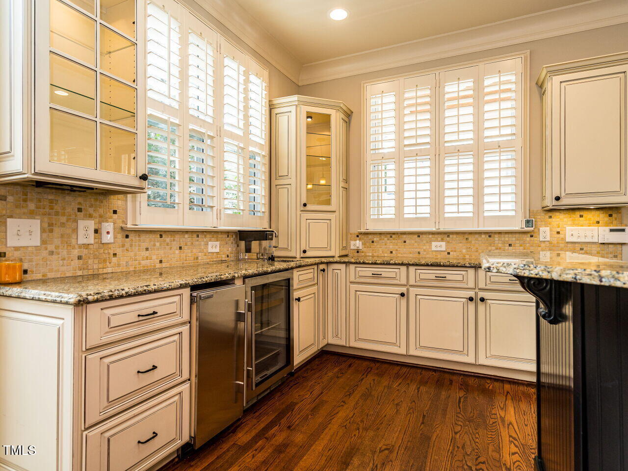 2315 Byrd Street Raleigh, NC 27608 - Photo 11 of 36 a kitchen with stainless steel appliances granite countertop a stove a sink and a microwave