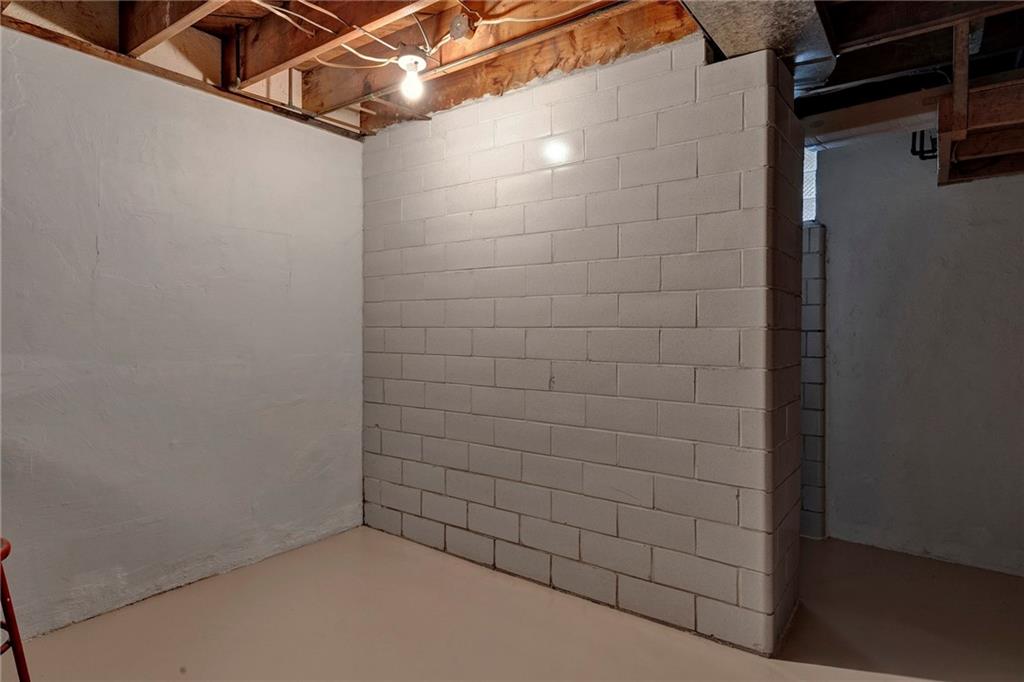 1256 Blaine Road Monaca, PA 15061 - Photo 18 of 23 Workshop..... a block tile shower and toilet and there is room for a sink to be installed.