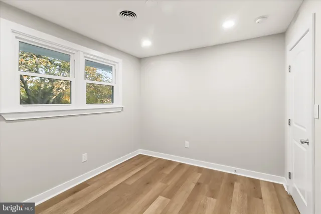 a garden view with a seating space