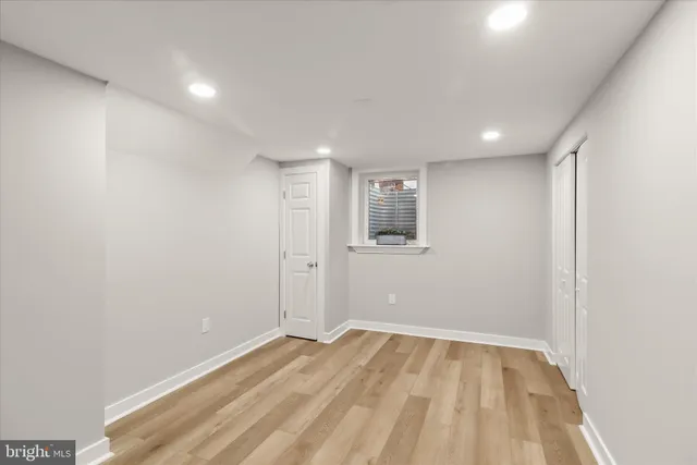 a view of a patio with table and chairs with a yard and plants