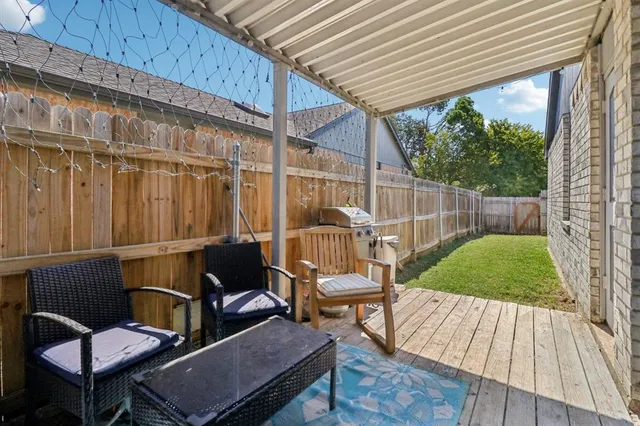 a view of outdoor space deck kitchen and outdoor seating