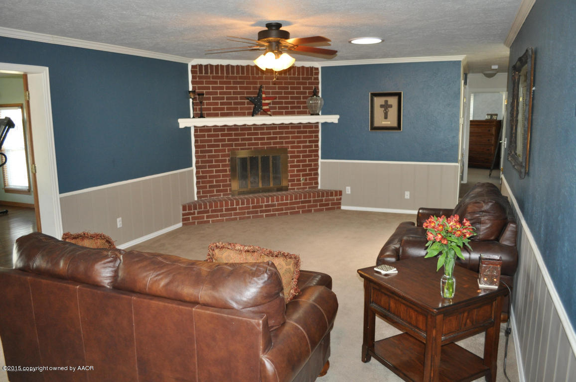 101 Rimrock Trail Amarillo, TX 79108 - Photo 8 of 33 2nd living with fireplace
