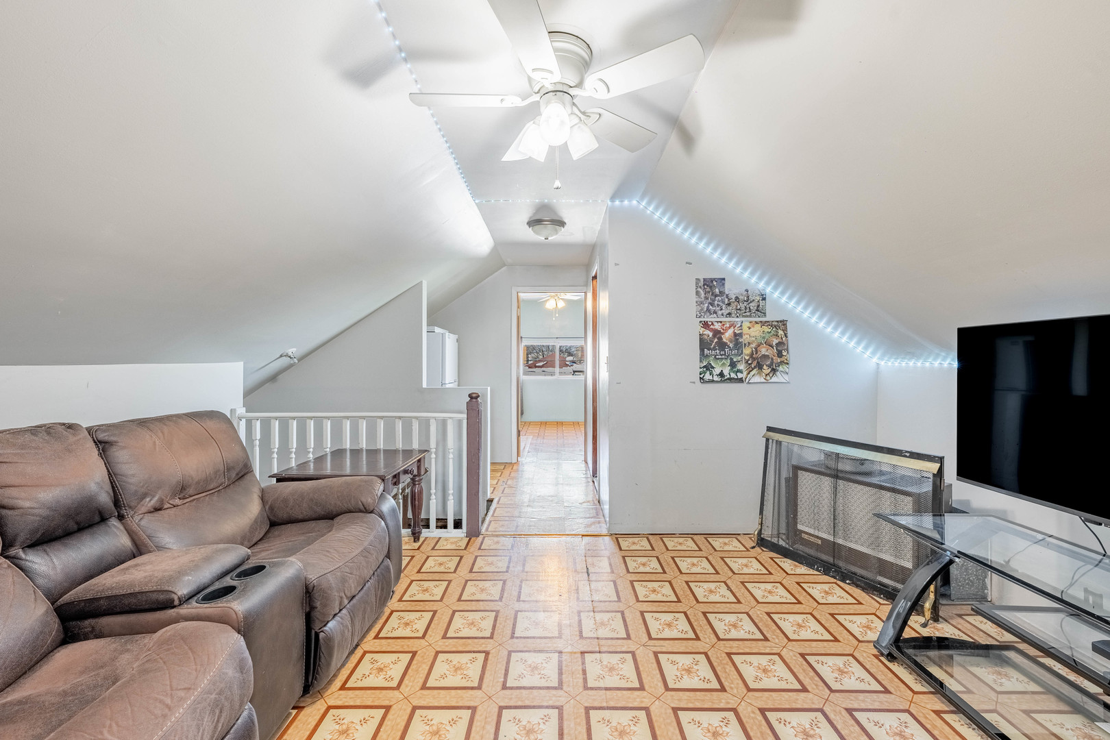 5026 West Addison Street Chicago, IL 60641 - Photo 17 of 34 a living room with furniture and a flat screen tv