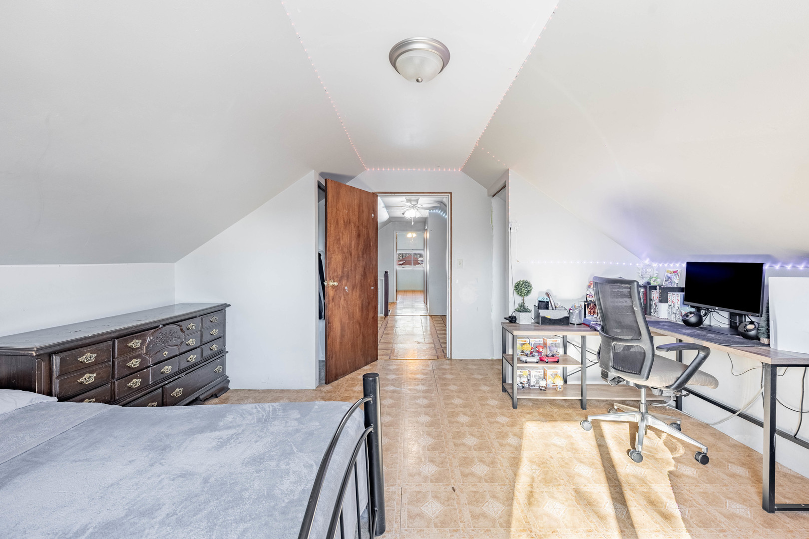 5026 West Addison Street Chicago, IL 60641 - Photo 20 of 34 a living room with furniture and a flat screen tv