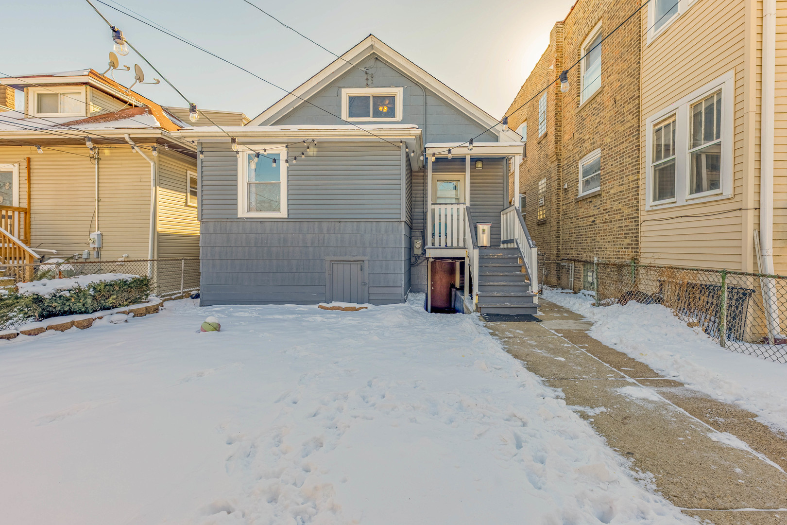 5026 West Addison Street Chicago, IL 60641 - Photo 32 of 34 a view of a house with backyard