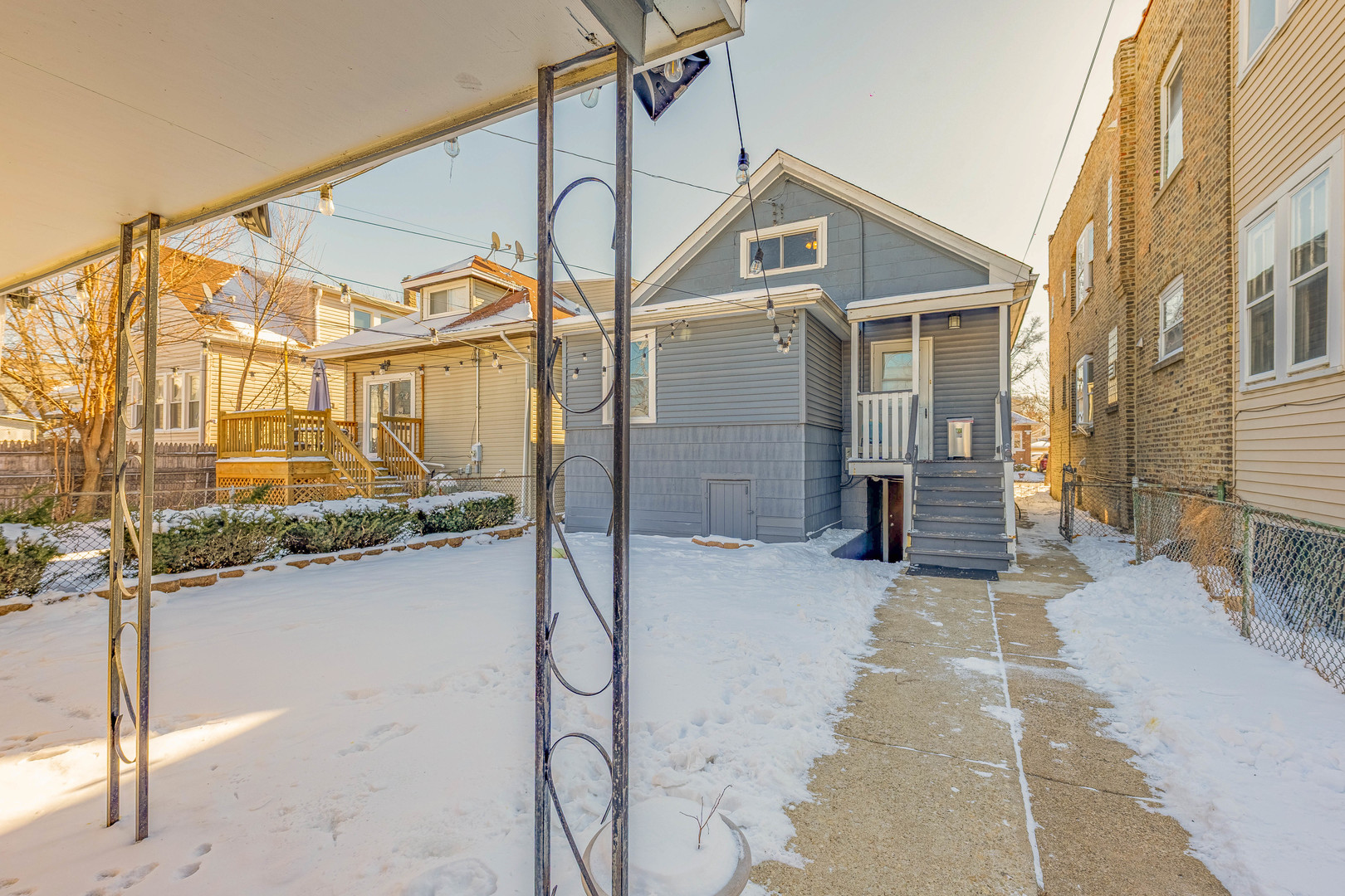 5026 West Addison Street Chicago, IL 60641 - Photo 33 of 34 a view of a house with a street