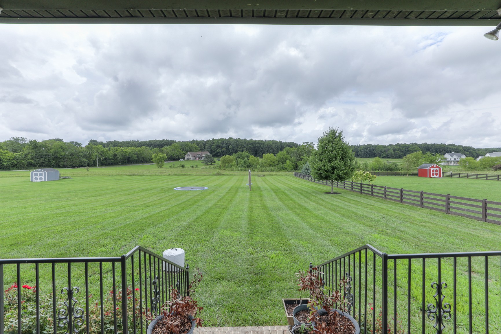 2152 Holloway Road Lebanon, TN 37090 - Photo 9 of 44 a view of a golf course with a lake
