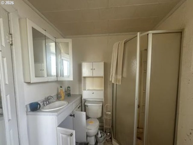 968 South 1st Street Union, OR 97883 - Photo 8 of 8 a bathroom with a sink a toilet and a mirror