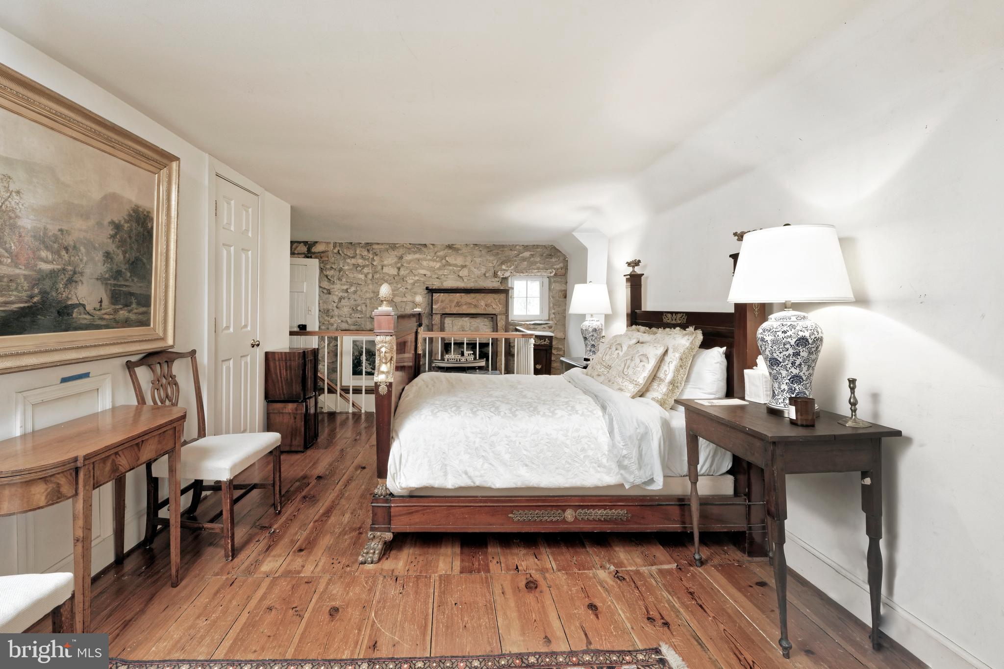 33195 Millville Road Upperville, VA 20184 - Photo 26 of 76 Primary bedroom suite has an exposed stone wall
