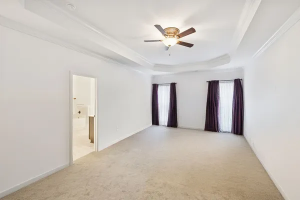 a view of a storage & utility room with a window
