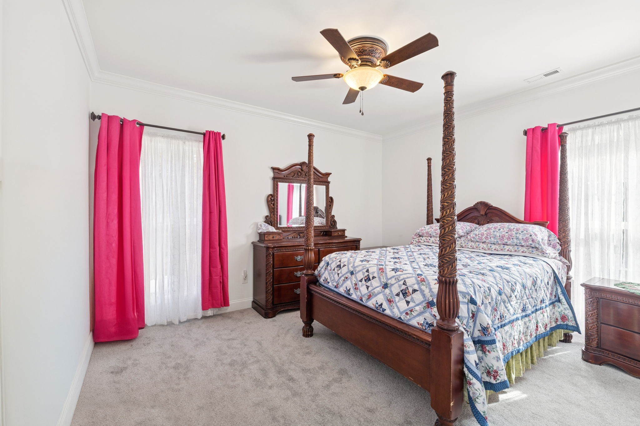 926 Monteagle Falls Road Monteagle, TN 37356 - Photo 15 of 30 a bed room with a bed and a chandelier