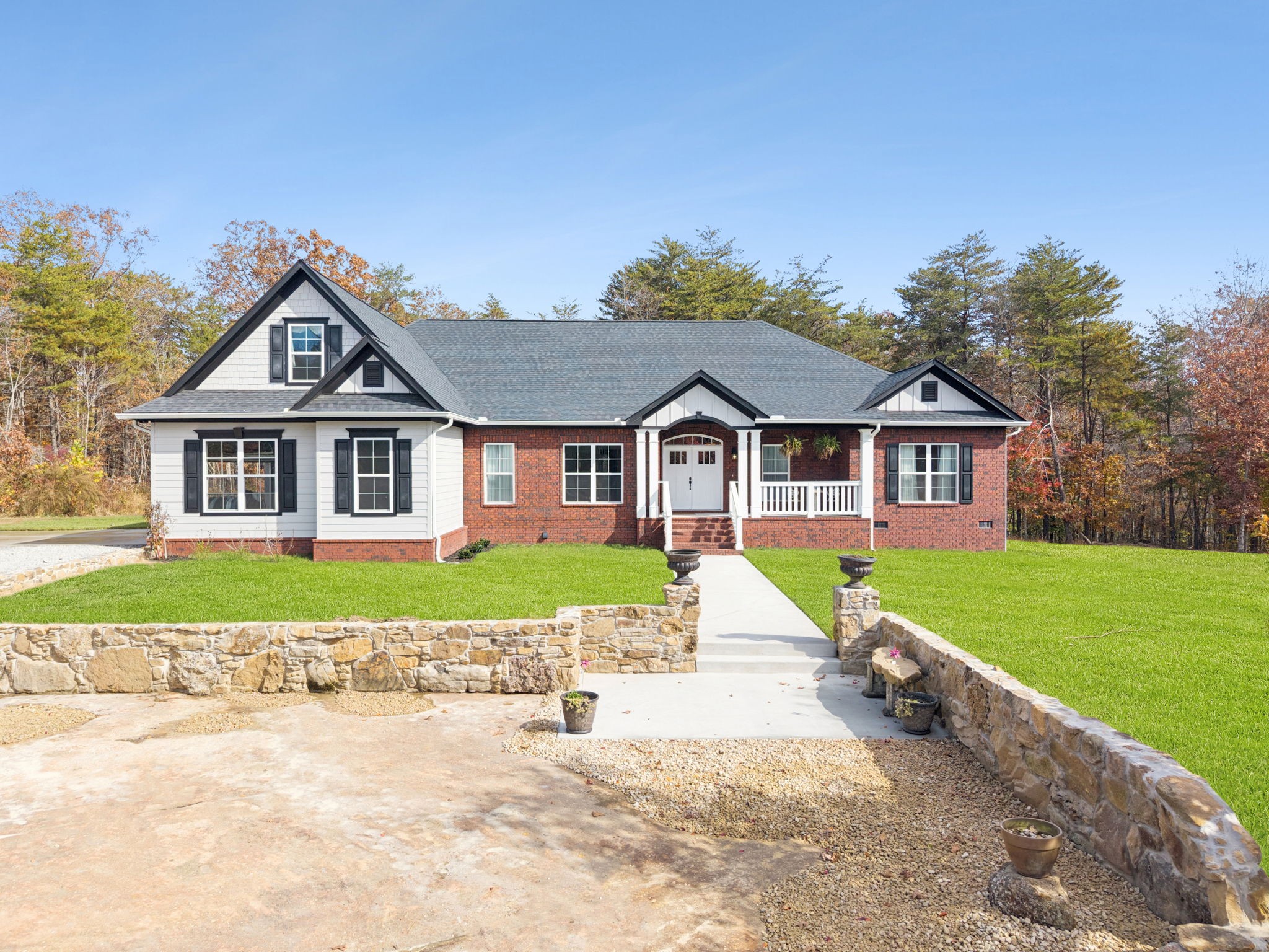 926 Monteagle Falls Road Monteagle, TN 37356 - Photo 2 of 30 a front view of a house with a yard and porch