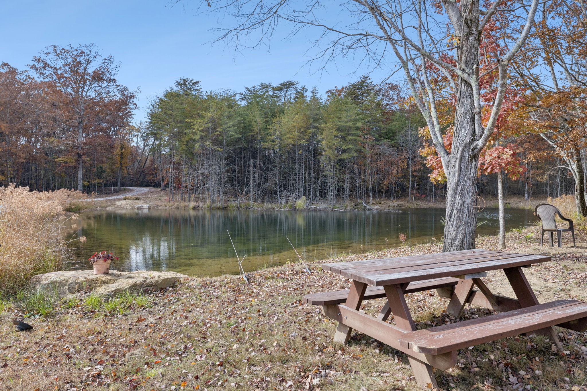 926 Monteagle Falls Road Monteagle, TN 37356 - Photo 26 of 30 a view of a wooden deck with a lake
