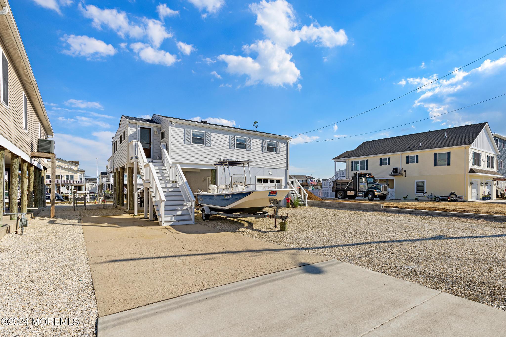 343 Kingfisher Road Tuckerton, NJ 08087 - Photo 3 of 25 a view of a building with sitting space