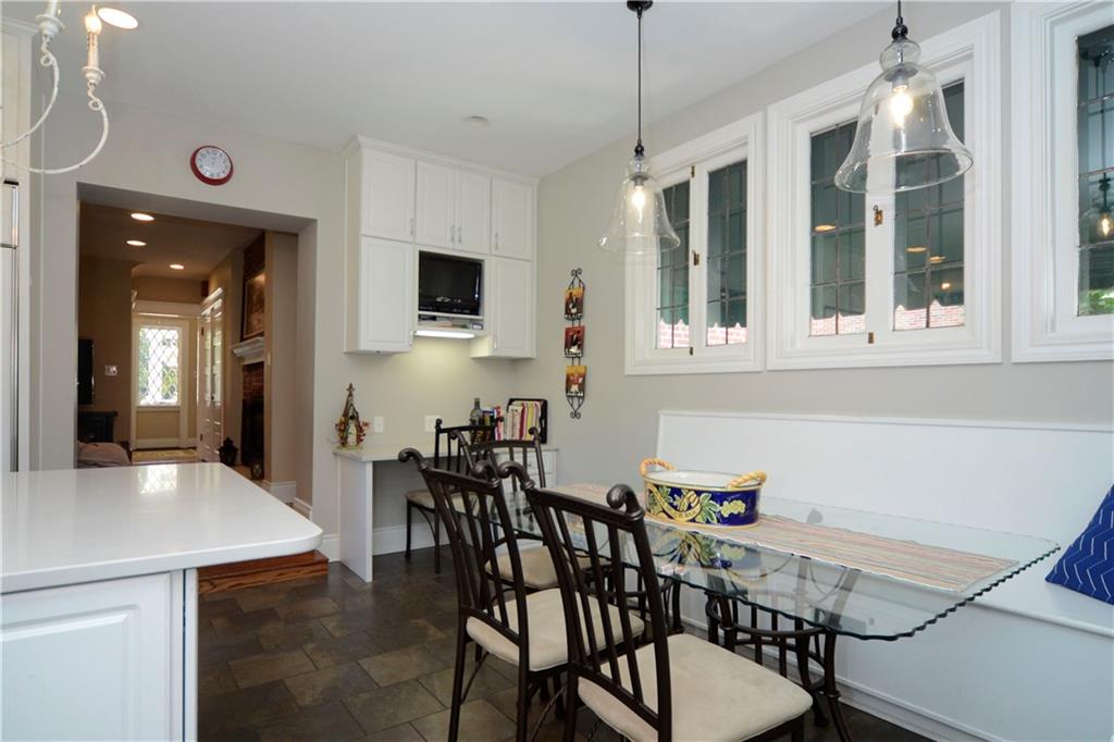 309 Quaker Road Sewickley, PA 15143 - Photo 14 of 25 The well-designed kitchen also features a home operations center -- ideal for organizing your activities from.