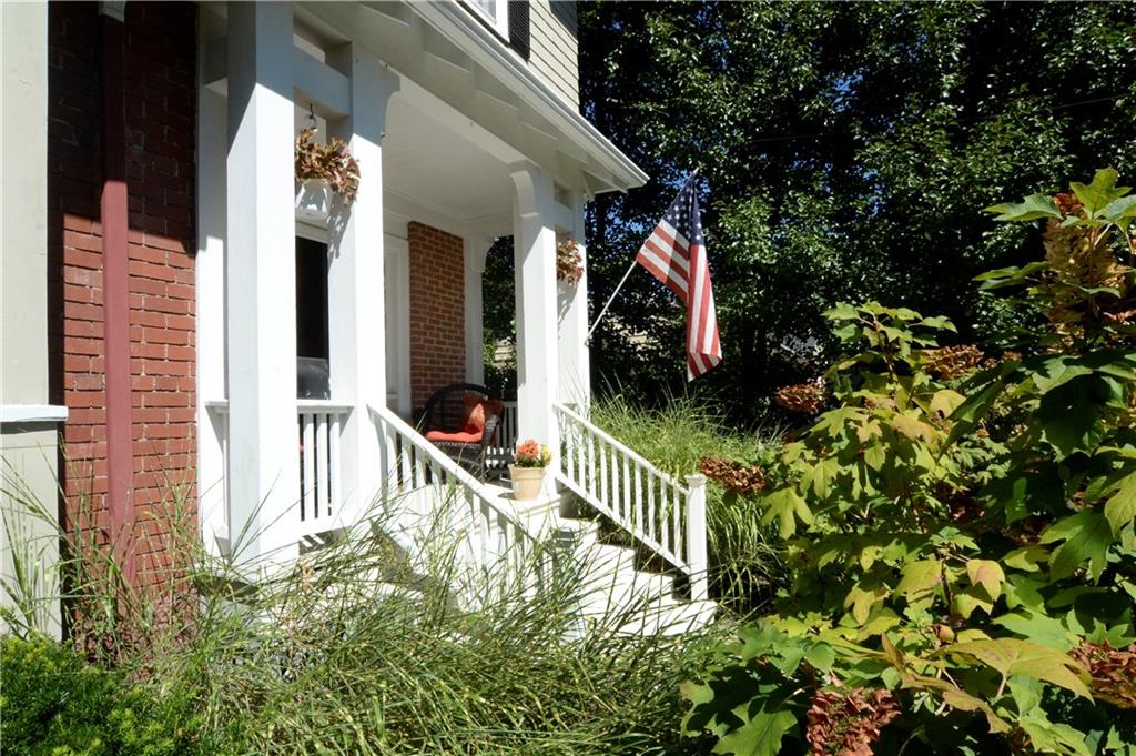 309 Quaker Road Sewickley, PA 15143 - Photo 23 of 25 Offering a charming spot to enjoy a cup of coffee -- the covered front porch.