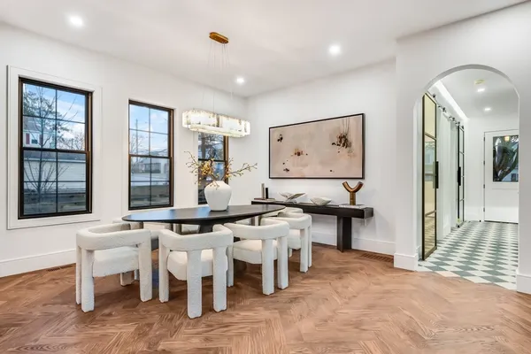 a view of a center island table and chairs